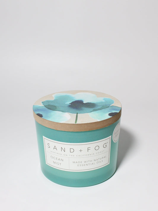 Ocean Mist 12 oz scented candle Aqua vessel with Painted Poppy lid