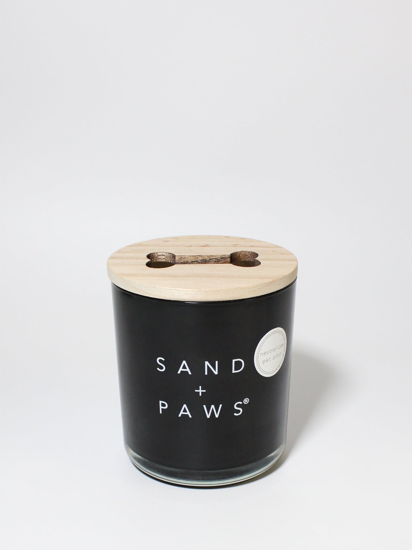 Sand + Paws Teakwood 11.5 oz scented candle Black vessel with cut out Bone wood lid