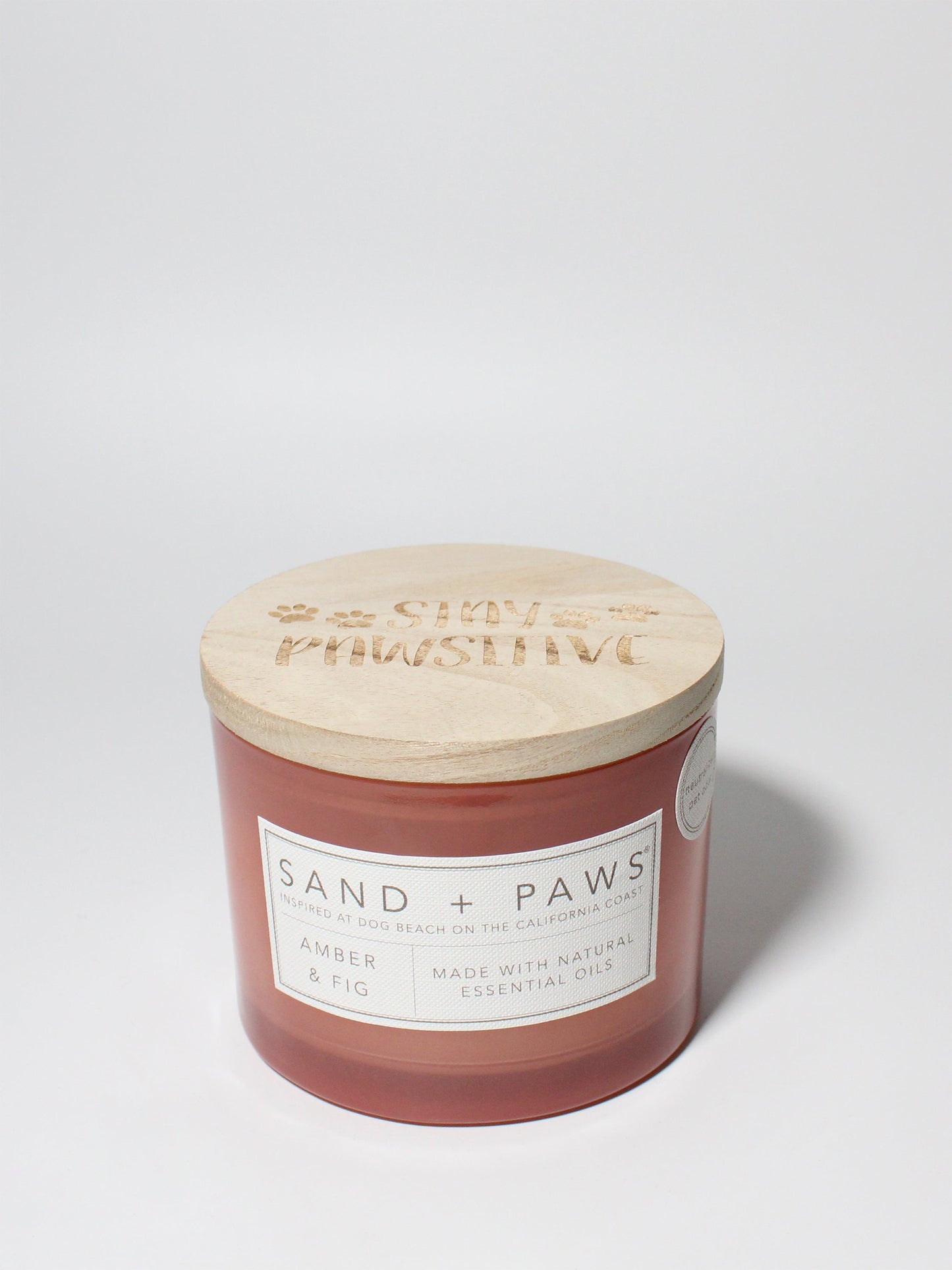 Sand + Paws Amber & Fig 12 oz scented candle Melon vessel with Carved Stay Pawsitive Lid