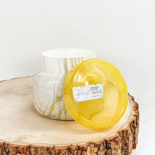Capri Blue | 19 oz. Marble Jar Candle in Yellow | Pineapple Flower